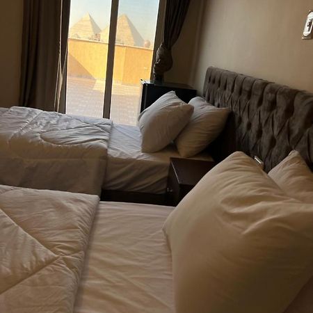 Bedouin Pyramids View Hotel Kafrat al Jabal Bagian luar foto