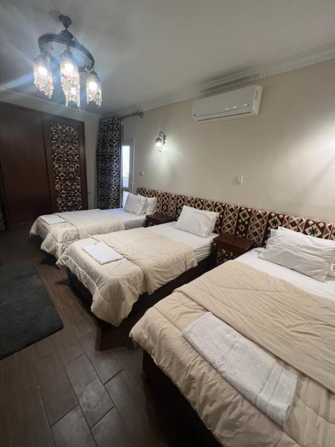 Bedouin Pyramids View Hotel Kafrat al Jabal Bagian luar foto