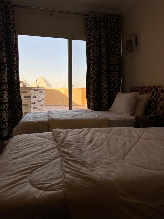 Bedouin Pyramids View Hotel Kafrat al Jabal Bagian luar foto