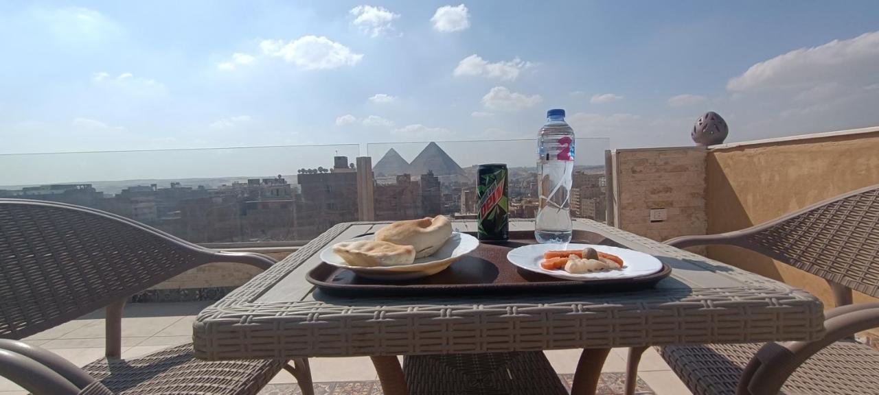 Bedouin Pyramids View Hotel Kafrat al Jabal Bagian luar foto