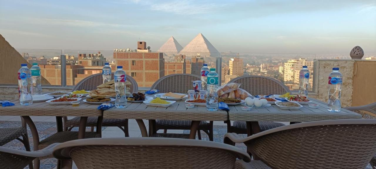 Bedouin Pyramids View Hotel Kafrat al Jabal Bagian luar foto